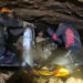 Rescue divers share the equipment usage guidelines with people trapped inside a cave during their rescue mission in Xaisom...