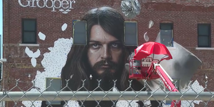 New mural of Leon Russell added to Grooper building in downtown Tulsa