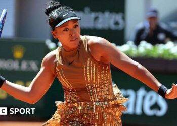 Naomi Osaka wears a gold sequined dress in the first round at the French Open