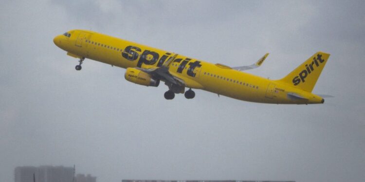 A Spirit Airlines airplane departs from Fort Lauderdale - Hollywood International Airport, Florida