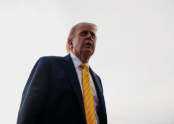 U.S. President Trump boards Air Force One for departure to Miami, Florida
