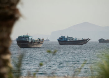 Vessels sail through the Strait of Hormuz