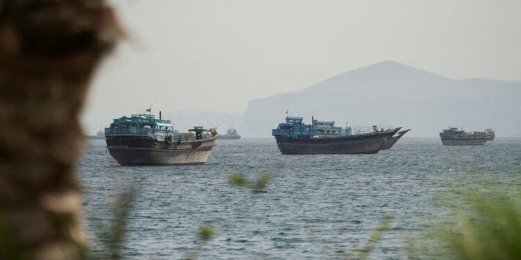 Vessels sail through the Strait of Hormuz