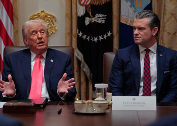 WASHINGTON, DC - DECEMBER 02: U.S. President Donald Trump (L) speaks as U.S. Secretary of War Pete Hegseth looks on during a meeting of his Cabinet in the Cabinet Room of the White House on December 02, 2025 in Washington, DC. A bipartisan Congressional investigation has begun regarding Secretary of War Pete Hegseth's role in ordering U.S. military strikes on small boats in the waters off Venezuela that have killed scores of people, which Hegseth said are intended "to stop lethal drugs, destroy narco-boats and kill the narco-terrorists who are poisoning the American people.” (Photo by Chip Somodevilla/Getty Images)