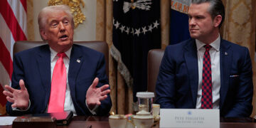 WASHINGTON, DC - DECEMBER 02: U.S. President Donald Trump (L) speaks as U.S. Secretary of War Pete Hegseth looks on during a meeting of his Cabinet in the Cabinet Room of the White House on December 02, 2025 in Washington, DC. A bipartisan Congressional investigation has begun regarding Secretary of War Pete Hegseth's role in ordering U.S. military strikes on small boats in the waters off Venezuela that have killed scores of people, which Hegseth said are intended "to stop lethal drugs, destroy narco-boats and kill the narco-terrorists who are poisoning the American people.” (Photo by Chip Somodevilla/Getty Images)