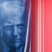 A banner depicting U.S. President Donald Trump hangs outside the Department of Justice building in Washington