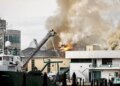 Firefighters extinguishing fire on University of South Florida campus in St. Petersburg