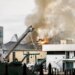 Firefighters extinguishing fire on University of South Florida campus in St. Petersburg
