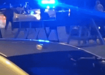Car ramming into police cruiser