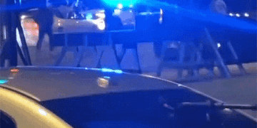Car ramming into police cruiser