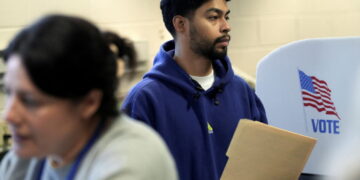 People line up to vote in Virginia's governor race in Richmond