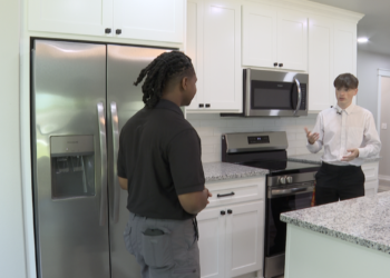 two shot WARNER HOME BUILDING PROGRAM