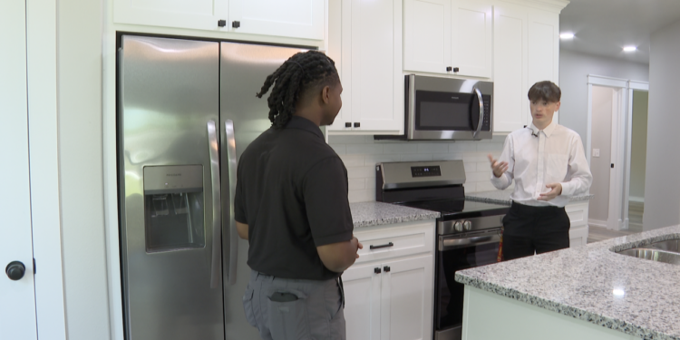 two shot WARNER HOME BUILDING PROGRAM