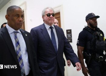 Former CEO of Apollo Global Management Leon Black (C) arrives to testify at a closed-door interview with the House Oversight Committee on Capitol Hill on June 26, 2026 in Washington, DC.