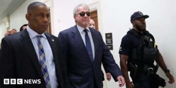 Former CEO of Apollo Global Management Leon Black (C) arrives to testify at a closed-door interview with the House Oversight Committee on Capitol Hill on June 26, 2026 in Washington, DC.