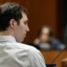 Tyler Robinson standing in a courtroom during a hearing in Provo, Utah