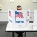 A person casting a ballot at the Fairfax Government Center in Virginia.