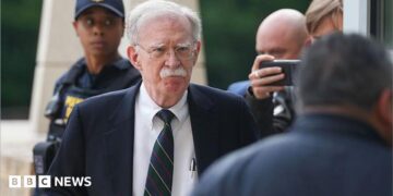 John Bolton arrives in court on Friday