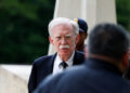Former White House national security adviser John Bolton arrives at the U.S. District Court for the District of Maryland, ...