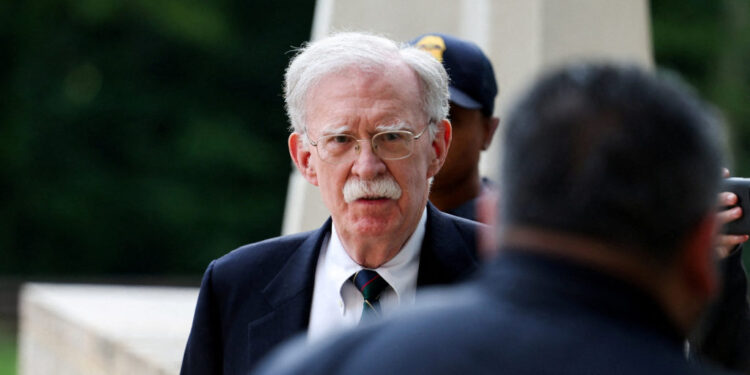 Former White House national security adviser John Bolton arrives at the U.S. District Court for the District of Maryland, ...