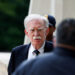Former White House national security adviser John Bolton arrives at the U.S. District Court for the District of Maryland, ...