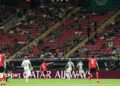 South Korea and Czech Republic play in front of a stand with a number of empty seats