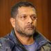 South Africa's deputy head of crime intelligence Feroz Khan is seen in court. He has short hair and a short beard