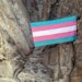 A group of transgender queer allied climbers unfurl a trans pride flag on El Capitan in Yosemite National Park