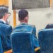 Courtroom sketch showing Karmelo Anthony seated with his defense team during his murder trial
