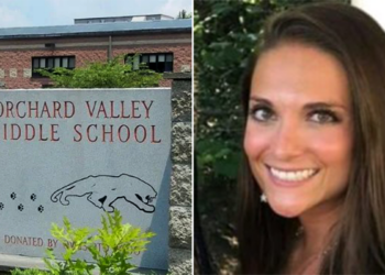 Ashley A. Fisler standing in front of Orchard Middle School