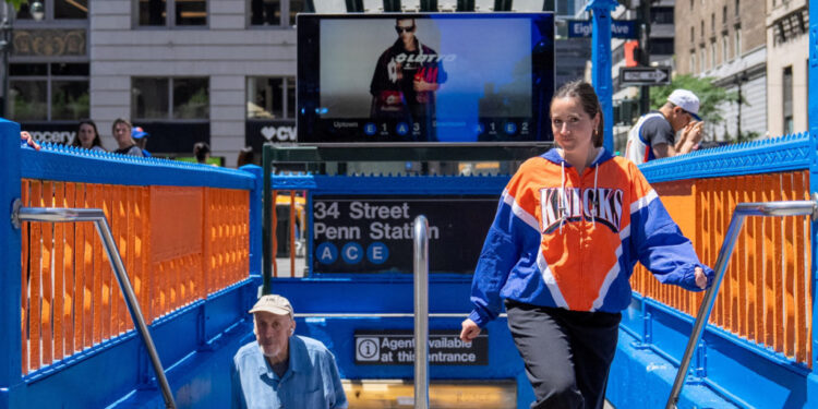 FILE PHOTO: 34th Street Penn Station Painted In New York Knicks Colors For NBA Finals