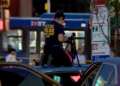 A cop on a police car in the Bronx