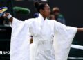 Naomi Osaka wears an all-white kimono as she prepares to warm-up before her first-round match at Wimbledon