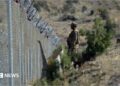 File photo of a soldier standing along the Pakistan-Afghanistan border