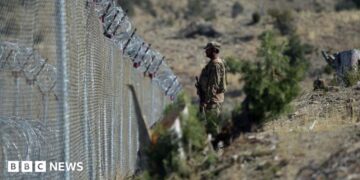 File photo of a soldier standing along the Pakistan-Afghanistan border