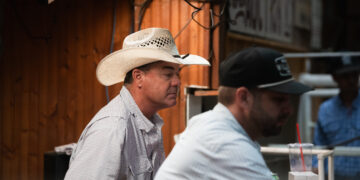 Brian Uptmore and Bodie Gist auction off cattle at the West Auction barn in West, Texas on Thursday, June 11, 2026.