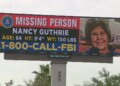 Nancy Guthrie's missing person billboard standing in Phoenix, Arizona.