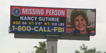 Nancy Guthrie's missing person billboard standing in Phoenix, Arizona.