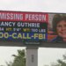 Nancy Guthrie's missing person billboard standing in Phoenix, Arizona.