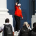 U.S. President Donald Trump waves as he returns to the White House, in Washington