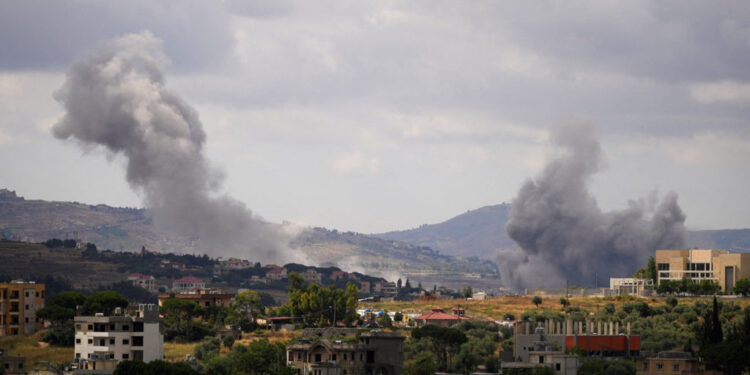 Smoke billows from southern Lebanon, following Israeli strikes, as seen from Nabatieh