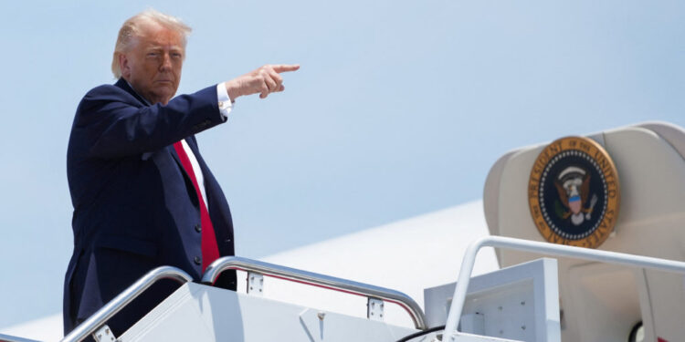 U.S. President Trump boards Air Force One en route to Eau Claire, Wisconsin, at Joint Base Andrews