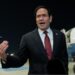Secretary of State Marco Rubio speaking to reporters after landing in Abu Dhabi
