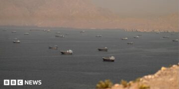 Vessels in the Strait of Hormuz, as seen from Oman on June 18, 2026.