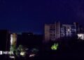 Residential buildings at night during a temporary power outage, which local authorities said was caused by technological disturbances in the peninsula’s energy grid