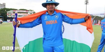 Vaibhav Sooryavanshi holds up an India flag to celebrate winning the Under-19 World Cup