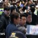 Former South Korea's head coach Hong Myung-bo meet by fans as he arrives at airport