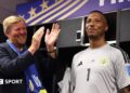 King Willem-Alexander of the Netherlands and Curacao goalkeeper Eloy Room