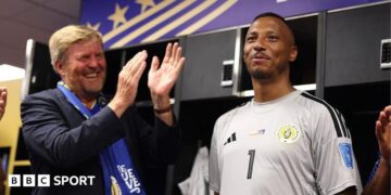 King Willem-Alexander of the Netherlands and Curacao goalkeeper Eloy Room