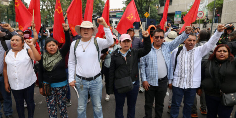 Dissident teachers from Mexico's National Coordination of Education Workers (CNTE) march toward Ciudad de Mexico Stadium